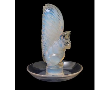 'Ecureuil' no.315 a Lalique opalescent glass cendrier designed by Rene Lalique, stencil R Lalique France, 9.5cm. diam. Catalo