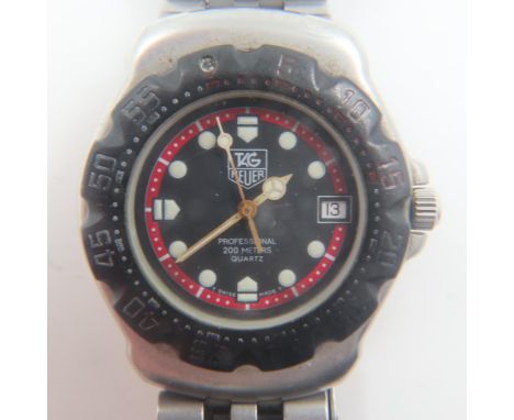 TAG HEUER: Professional 200m midi quartz divers wristwatch on steel bracelet, requires battery. Hands do not adjust as they s