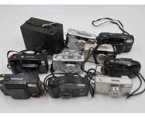 Collection of cameras, one box camera and 18 instant cameras including Pentax and Minolta (19). Not available for in-house P&