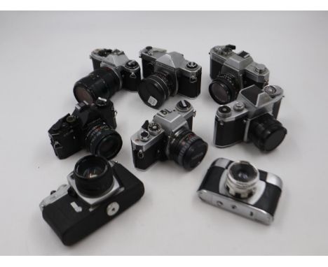 Collection of cameras and camera bodies including Minolta, Canon and Praktica (16). Not available for in-house P&amp;P