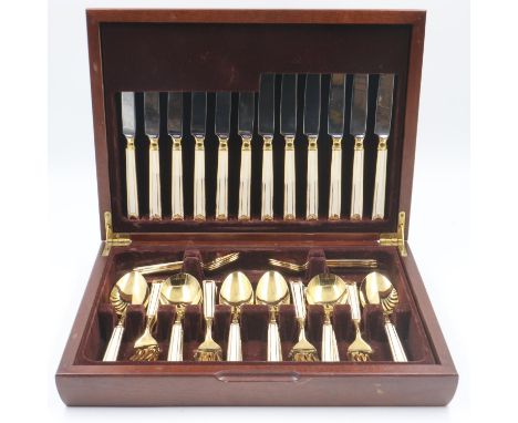 Contemporary Japanese cutlery service of 44 pieces, within a mahogany canteen. UK P&amp;P Group 3 (£30+VAT for the first lot 