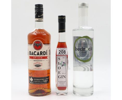 Bedrock Gin 70cl with a 1L bottle of Bacardi spiced rum and a 20cl bottle of sloe gin. UK P&amp;P Group 3 (£30+VAT for the fi