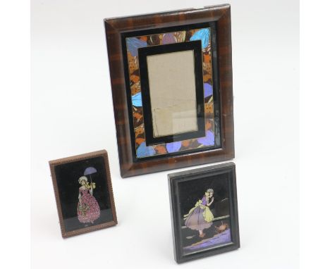 Two butterfly wing miniatures of ladies and a picture frame with a border of butterfly wings, frame easel at fault. 9 x 6.5 c