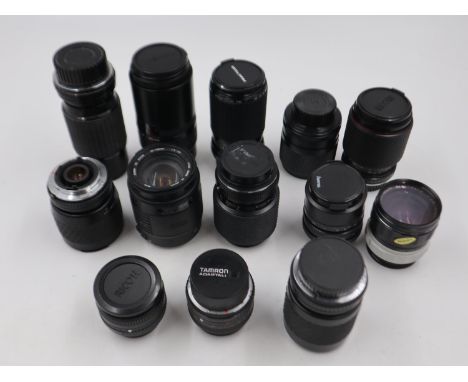 Collection of camera lenses including Bell and Howell and Ricoh (30+). Not available for in-house P&amp;P 