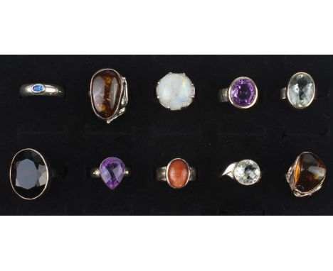 Ten mixed gemstone and sterling silver rings - of varying designs and settings, including rings set with Baltic Amber,&nbsp;A