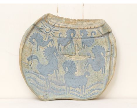 Andrew Adair (Scottish): an earthenware studio pottery distorted dish - decorated with stylised horses with the sun above, in