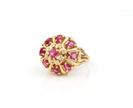 A 14ct gold dome-top ruby and diamond cluster ring