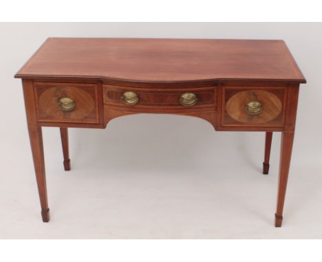 An Edwardian satinwood banded mahogany break bowfront side table - the satinwood banded top over three drawers and an arched 