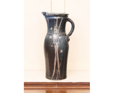 **Michael (Mick) Casson, OBE (British, 1925-2003): a large studio pottery jug, salt glazed in shades of blue with scratched g