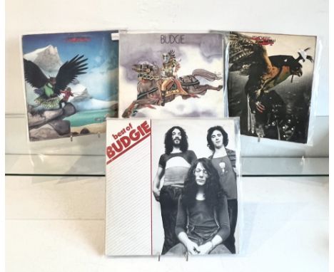 Budgie: four original Rock vinyl LPs - comprising Budgie; Never turn you back on a friend; In for the kill!; and Best of Budg