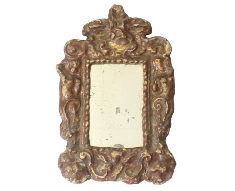 An antique Italian papier-mache gilt mirror &ndash; probably first half 19th&nbsp;century, the original rectangular plate wit