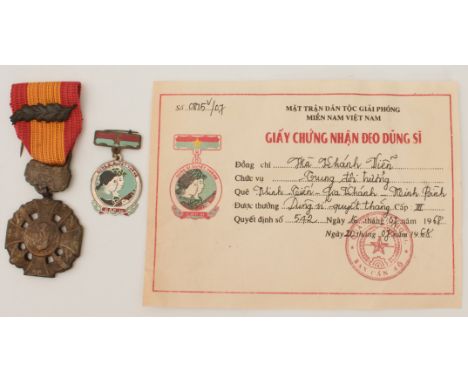 A Republic of Vietnam Gallantry Cross Medal (1949-1974 palm branch) and a&nbsp;Vietcong 1968&nbsp;3rd class 'American Killer'