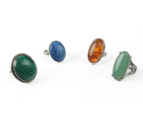 Three sterling silver and gemstone rings - set with malachite, lapis lazuli and Baltic amber; together with a silver plated a