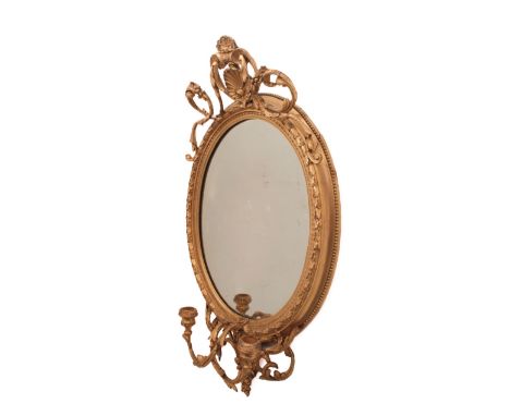 An early 19th&nbsp;century rococo-style gilt and composition girandole mirror.