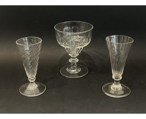 Three Georgian glasses - comprising a pan top rummer with panel cut bowl, bladed knop stem and plain foot with ground pontil,