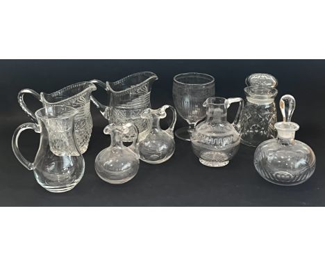 A collection of antique glass - including a pair of Victorian moulded glass water jugs, 15.3cm high; a set of five late 19th 