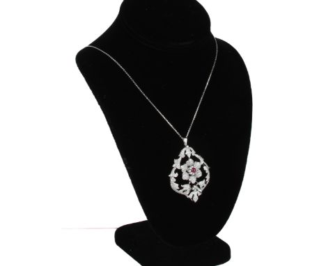 A fine 18ct white gold, ruby and diamond pendant