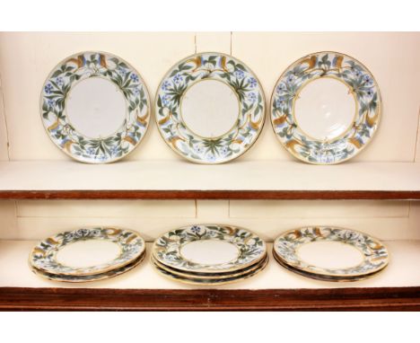 **Laurence McGowan (British, b.1942): a set of ten stoneware studio pottery plates - painted with pairs of birds, leaves and 