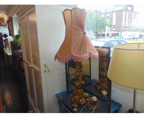 A gilt eastern style lamp