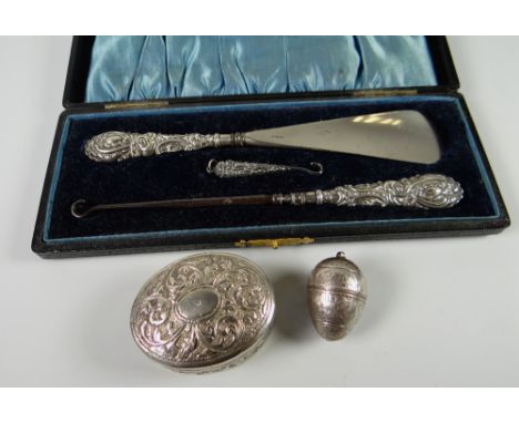 A CONTINENTAL SILVER OVAL BOX, CASED BUTTON-HOOK SET & POSSIBLY SILVER CURIO 