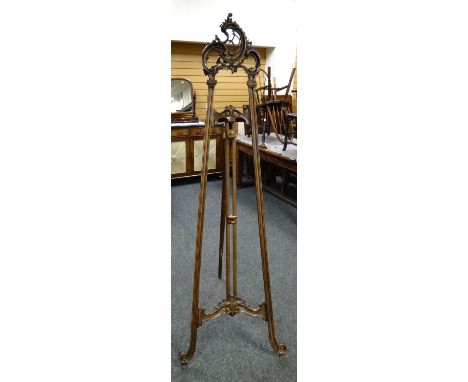 ANTIQUE MAHOGANY EASEL with elaborate carved finial, 192cms