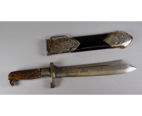 A GERMAN THIRD REICH HEWER DAGGER BY CARL EICKHORN having a clip point steel blade inscribed 'Arbeit Adelt', silver plated hi