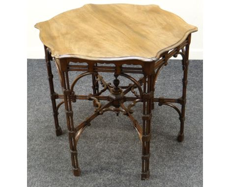 A MAHOGANY OCCASIONAL TABLE with a super architectural base & shaped top, 85cms diam