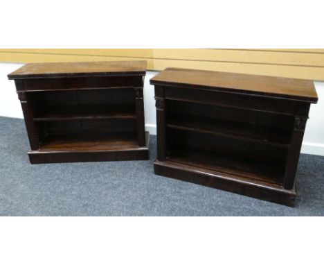 A PAIR OF REGENCY ROSEWOOD DWARF BOOKCASES drawer lining stamped H Goertz (1814-1840), carved detail to flanks, long single d