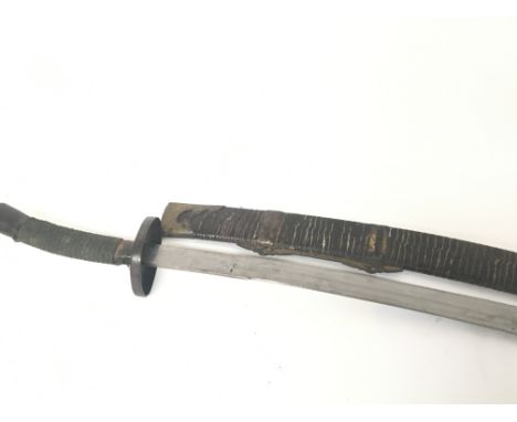 A Genuine Chinese Boxer Rebellion Executioners sword with brass mounts the scabbard with leather twine.  Quing Dynasty. Total