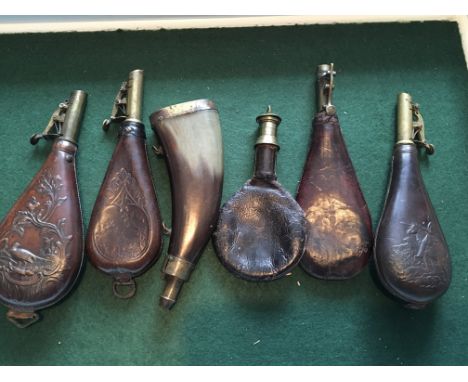 A collection of leather shot and powder flasks and a horn flask (6)