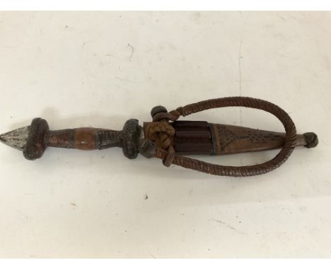 Early 20th/late 19th century African white metal dagger in leather sheath 28cm length