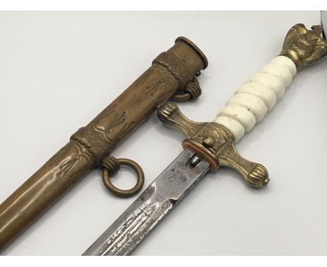 A German Third Reich Kriegsmarine officers presentation dagger with makers mark the wire missing from the grip.
