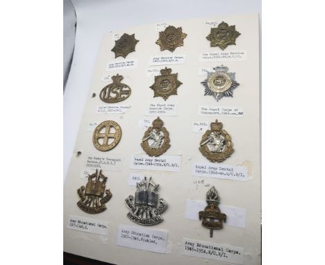 An album containing military badges Royal Army Service corps Royal Engineers Army Cyclist Corps and other service corp badges