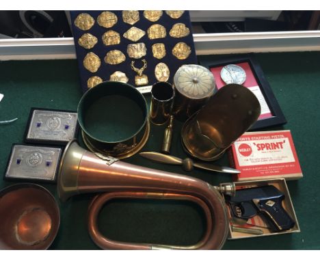 A collection of trench art a bugle with Norfolk regimental badge attached badges and a vintage Webley starting pistol boxed w