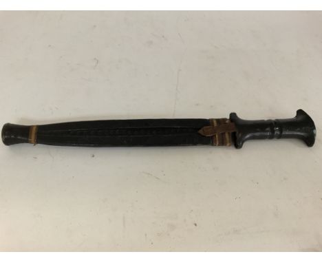 Early 20th century African double sided white metal dagger in leather sheath 34cm length