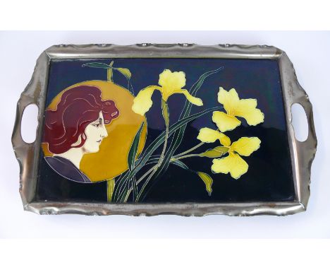 An Art Nouveau rectangular tray with silver-plated mount
By Carl Sigmund Luber for Johann von Schwarz, having tube lined deco