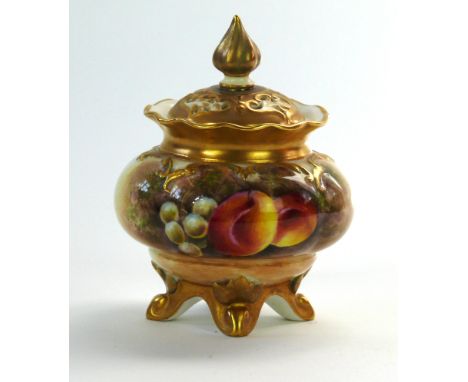 A Royal Worcester fruit painted pot pourri jar and cover, post war
Of rounded globular form, raised on four swept gilt suppor