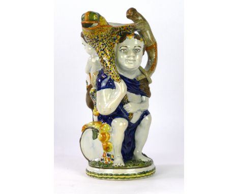 A Staffordshire wood-type 'Bacchus & Pan' pearlware jug
Bacchus modelled wearing lion skin robe and pan standing at the rear 