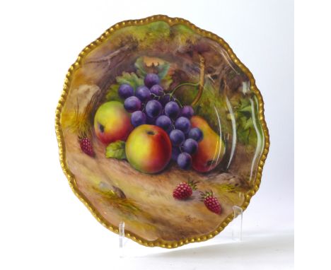 A Royal Worcester hand painted fruit cabinet plate
Having a scalloped edge, painted by Thomas Lockyer, factory marks and date