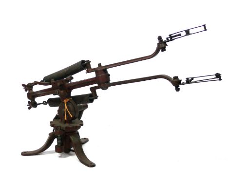 A vintage twin arm clay pigeon trap
each arm independently sprung, with adjustment angle handle. (illustrated) 