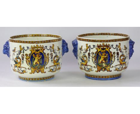 A pair of French Gien Faience jardiniere's, early 20th Century 
Each of circular form raised on a low foot ring and flanked b