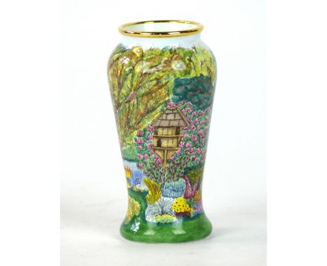 A limited edition Moorcroft enamel vase, of cylindrical form decorated in the Eve's garden pattern
Limited edition of 100, nu