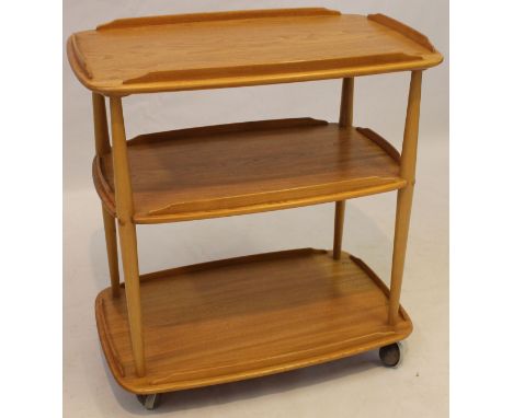An Ercol light elm three tier tea trolley
Height 77, width 72cm.
