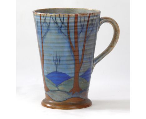 A rare Crown Ducal pottery single handled vase of tapering cylindrical form
Having tube lined decoration in the form of Charl