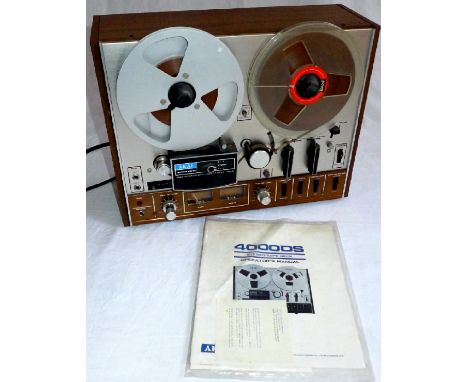 Akai 4000DS Reel to Reel Recorder/Player. 
Complete with Manual & Reels. Sold electrically untested. 
