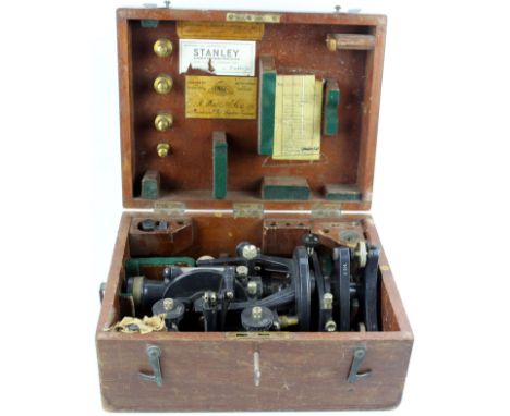 A boxed ER Watts &amp; Son theodolite mid 20th Century The grey painted theodolite no. 20338 set on three adjustment pins, he