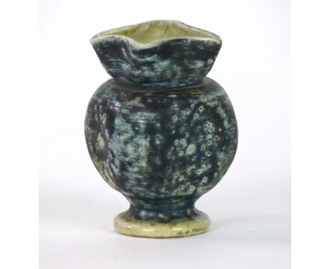 A Martin Brothers ware vase with square body and neck
Decorated with a black and black glaze, signed to base, height 8cm (chi