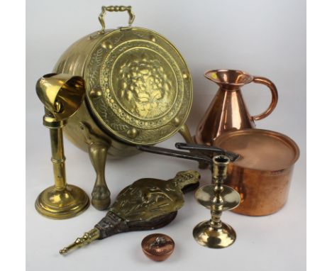 A substantial brass barrel shaped coal purdonium early to mid 20th Century
The pierced and florally embossed lid to reveal a 