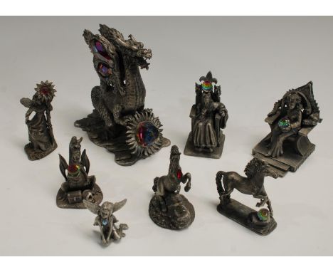 A WAPW pewter model, The Great Sun Dragon, modelled by AG Slocombe, set with crystal stones, 14cm; others, King Arthur, Mothe