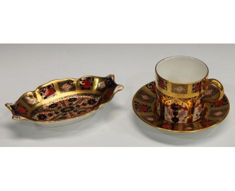 A Royal Crown Derby Imari palette 1128 pattern coffee can and saucer; an 1128 pattern shaped oval trinket dish, both solid go